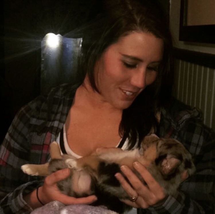 Liz Robison, Irrigation Service Manager, with her rescued puppy