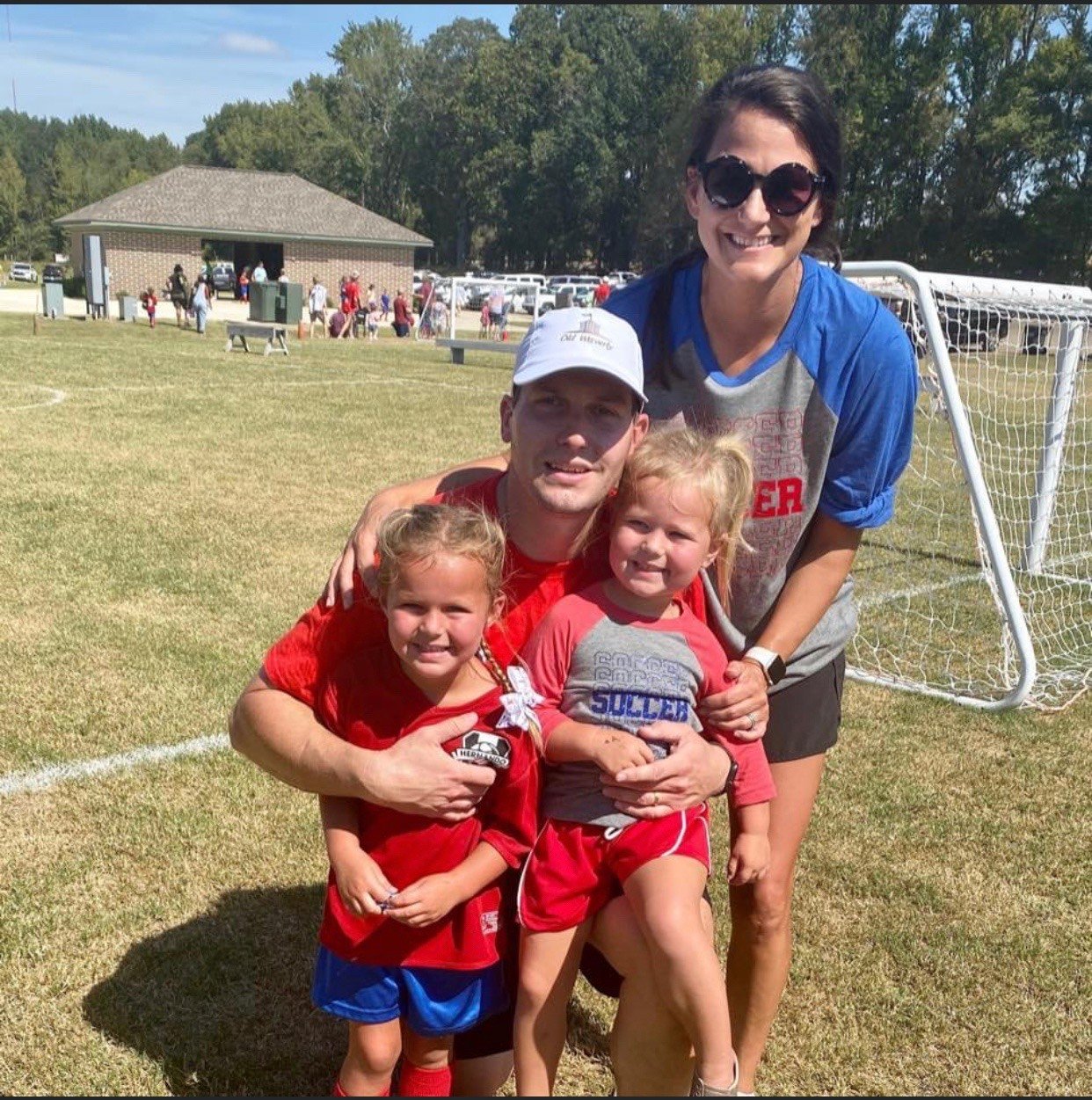 Russ Sneed with his wife and daughters