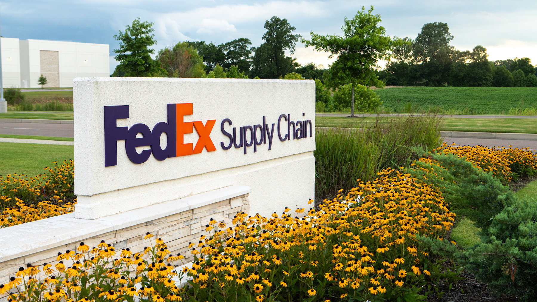 Legacy Park FedEx Warehouse sign and landscape