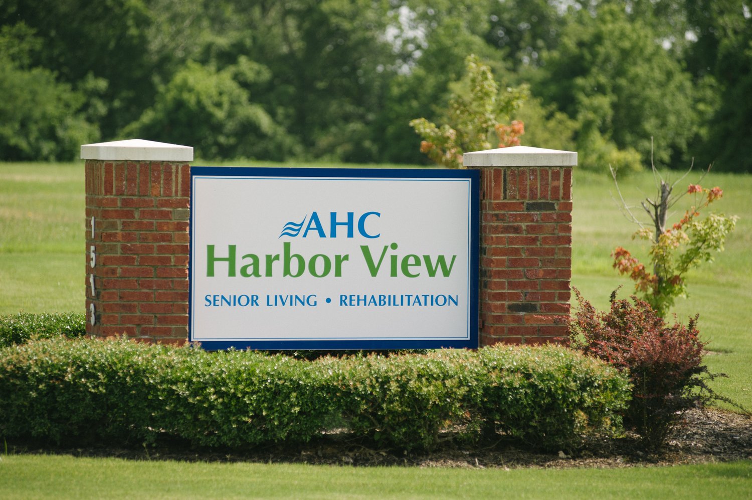 AHC Harbor View Senior Living Sign with clear view plantings