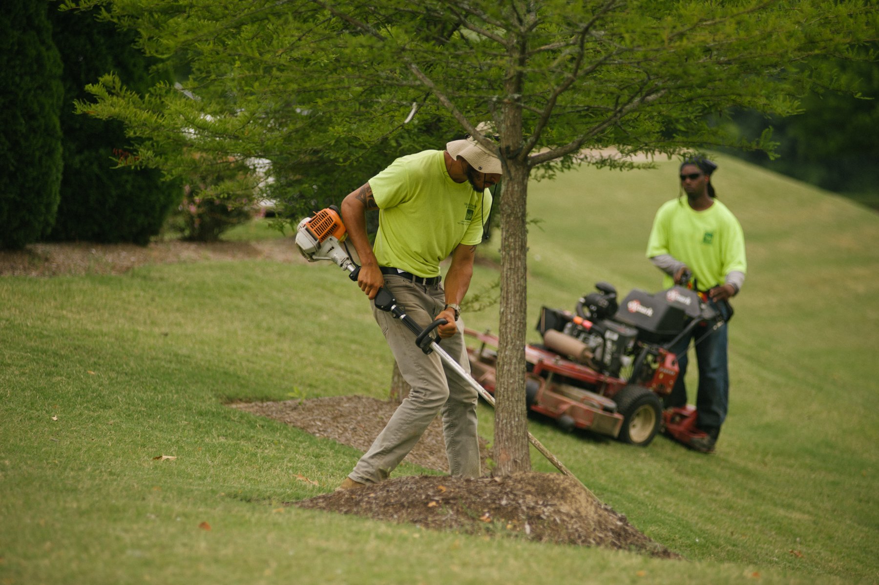 Commercial landscape mowing and maintenance team