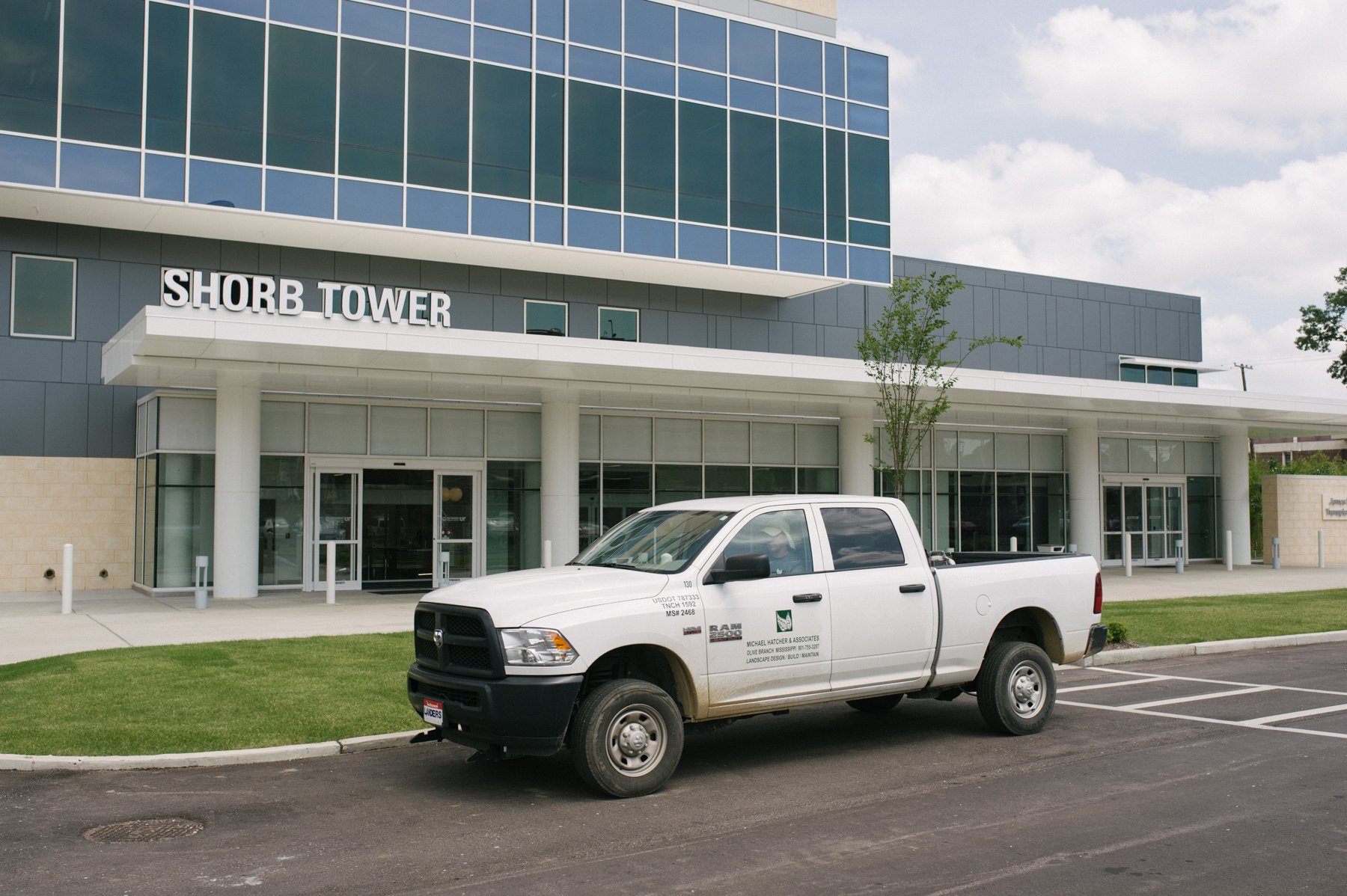 Michael Hatcher landscaping truck at commercial property