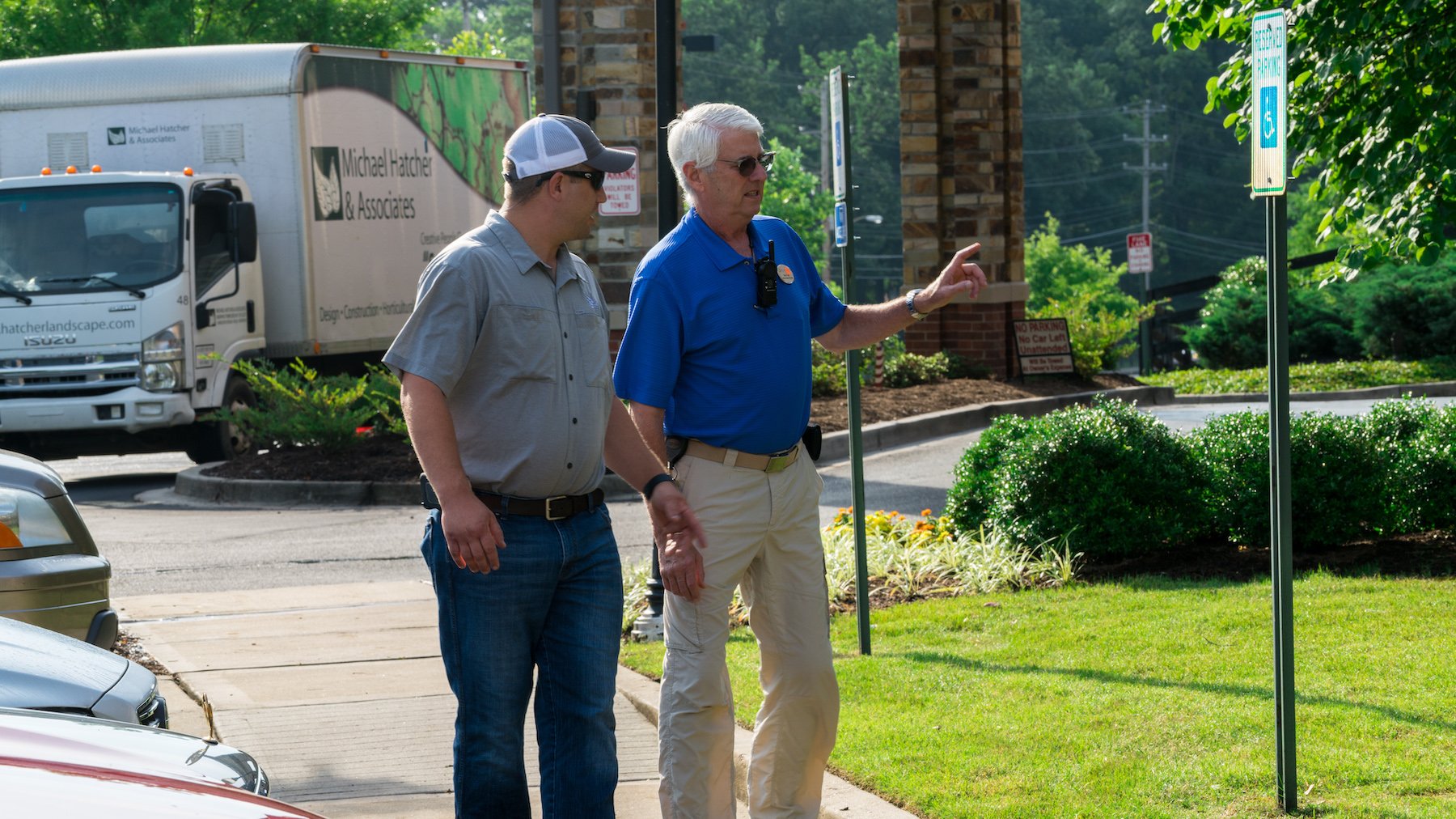 Landscaping account manager meeting with the customer on the property