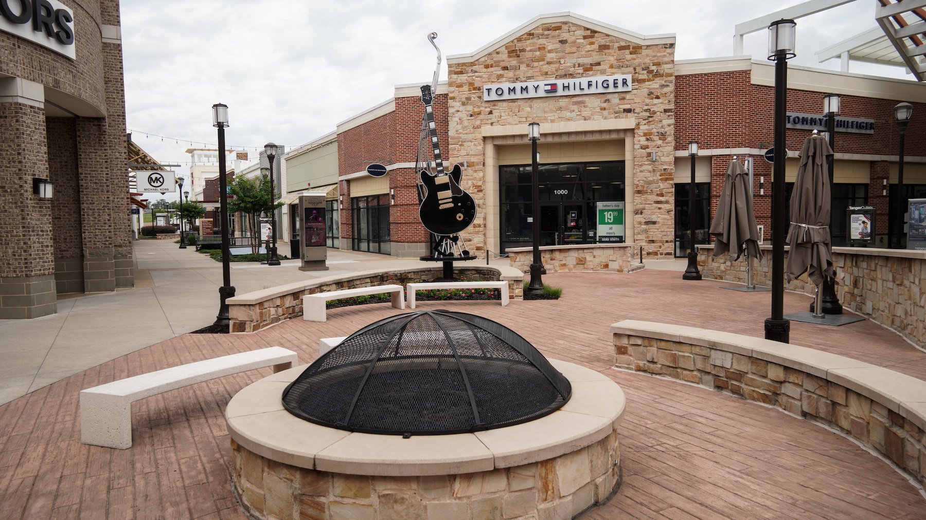 Tanger Outlets shopping center seating area and fire pit