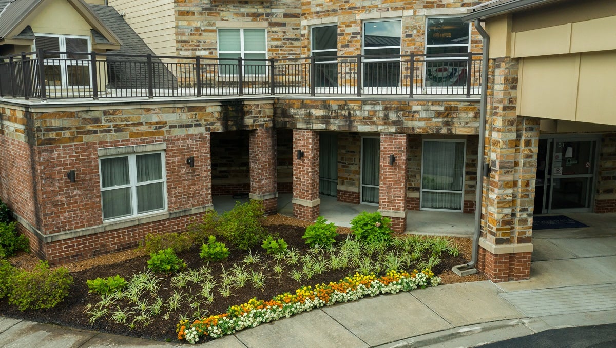 Dogwood Creek Senior Living planting beds with lots of colorful annuals and perennials