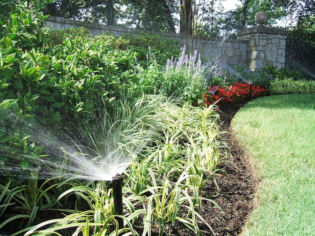 automatic irrigation waters landscape beds