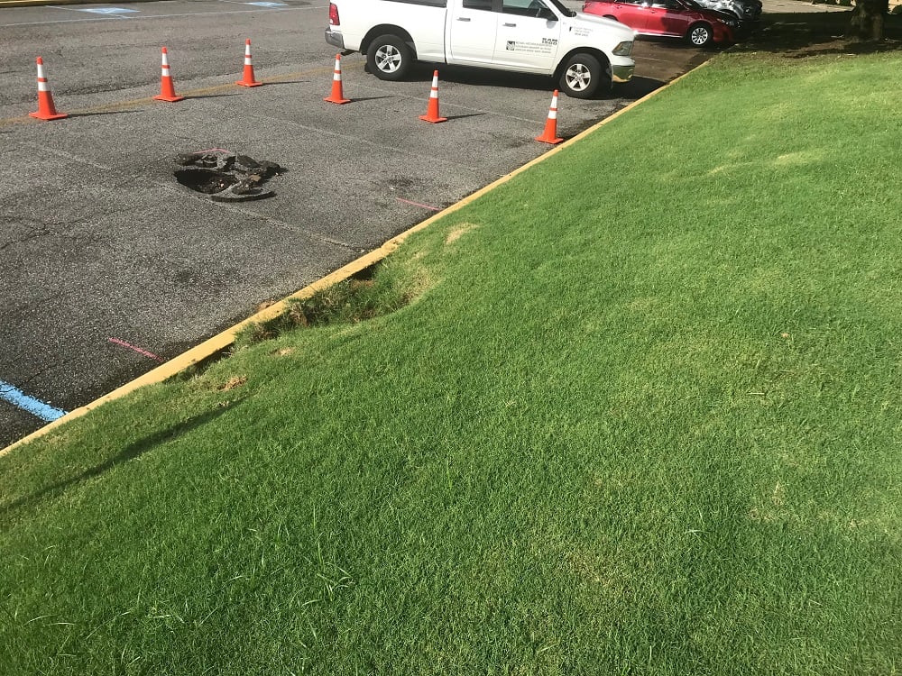 commercial property pavement damage from erosion