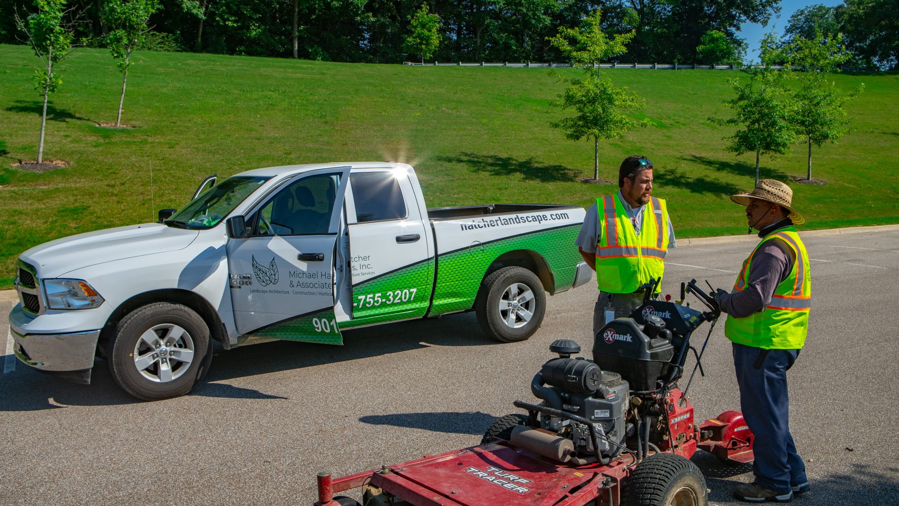 landscape professionals prepare to mow lawn 